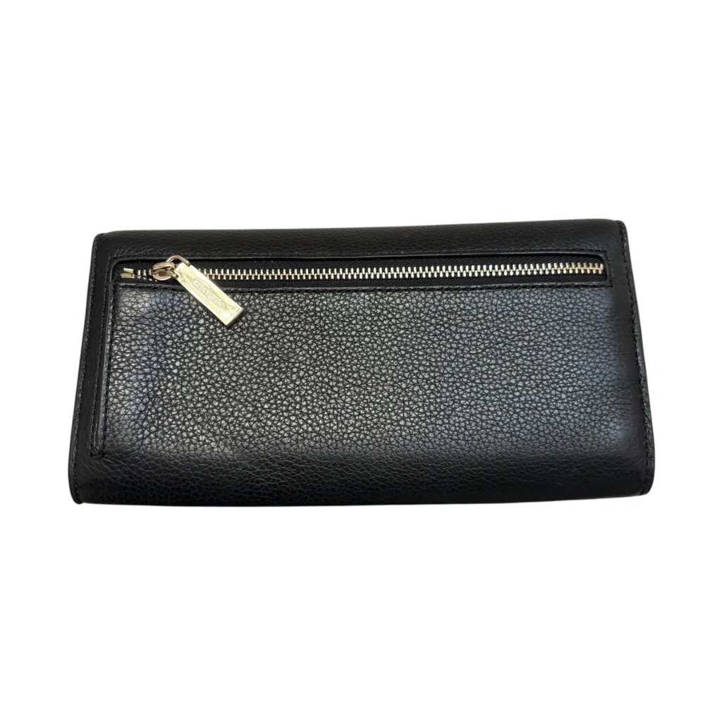 Kate Spade New York Marti large slim flap wallet in black pebbled leather